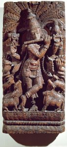 Krishna speelt fluit (hout)